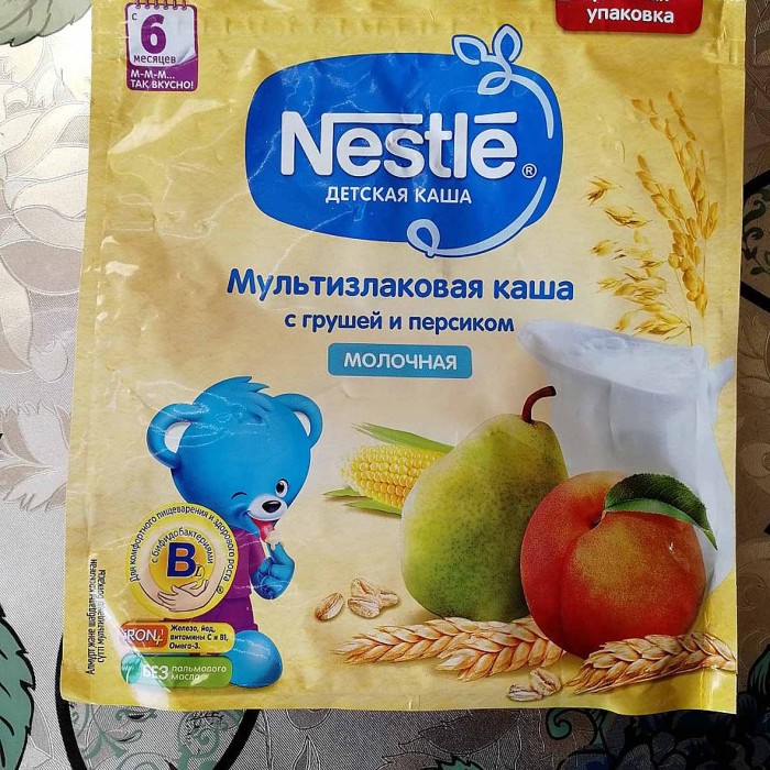 Каша Nestle мультизлаковая молочная груша-персик с 6мес 220гр д/п
